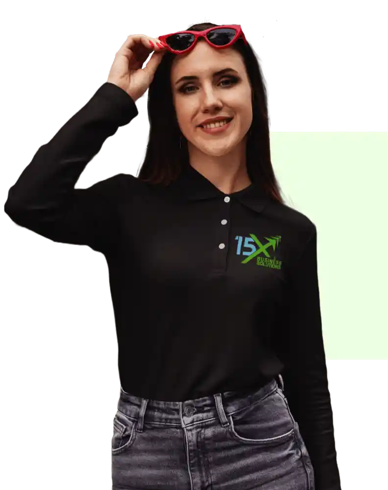 15X Business Solutions team member wearing a black branded polo shirt and red sunglasses, smiling against a transparent background.